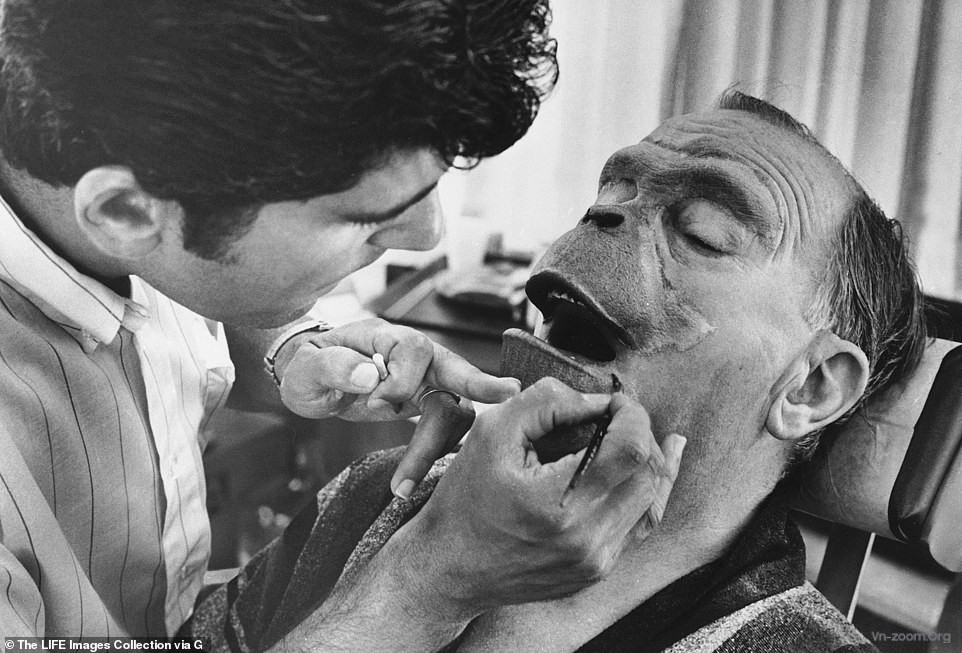 22715018-7830755-Foam_rubber_make_up_being_applied_to_actor_Maurice_Evans_face-a-43_1577478832810.jpg